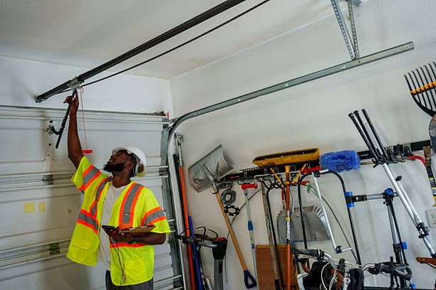 Professional Garage Door Maintenance technician working in Eugene, OR